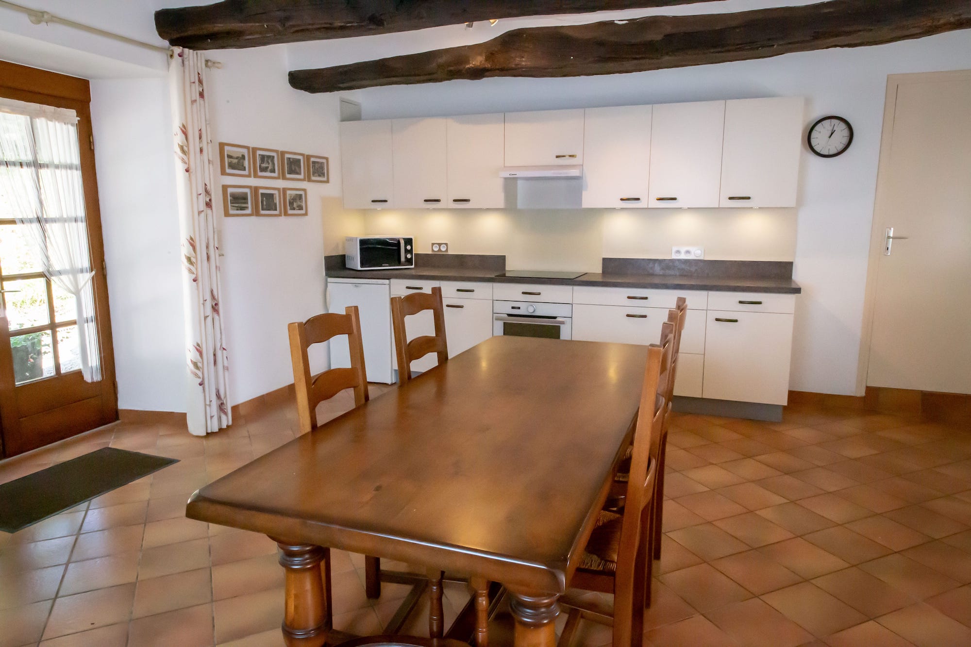 Fully equipped kitchen with oven, hob, 2 under counter fridges and an undercounted freezer.
