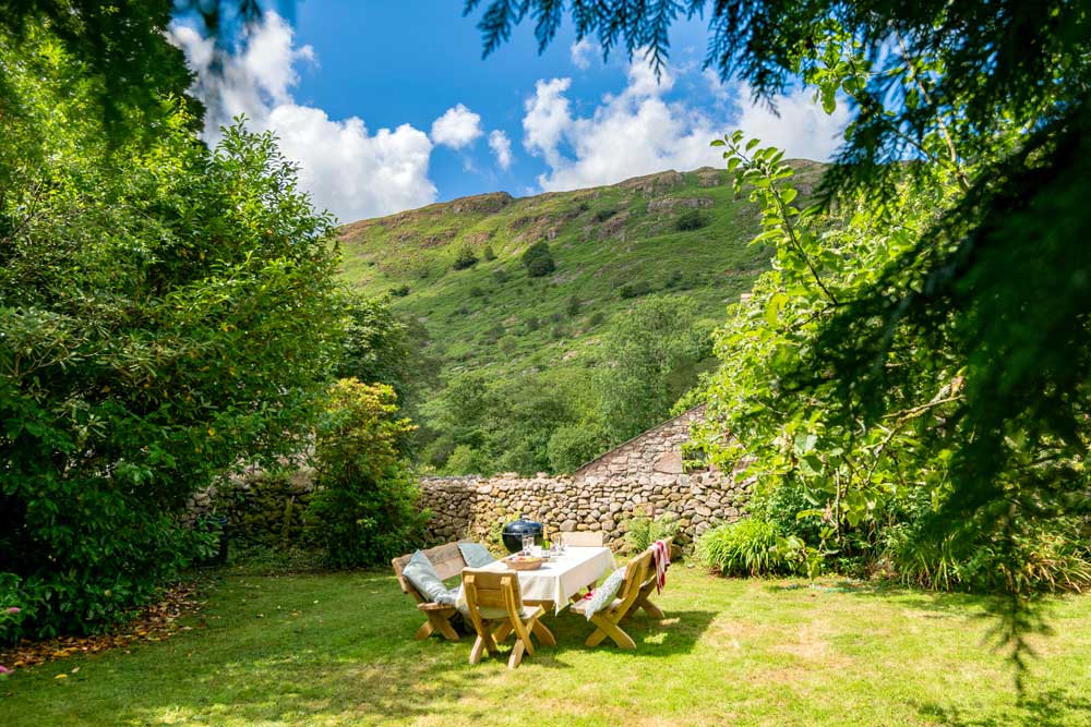 Chill in the Farmhouse garden and soak up the fell views.