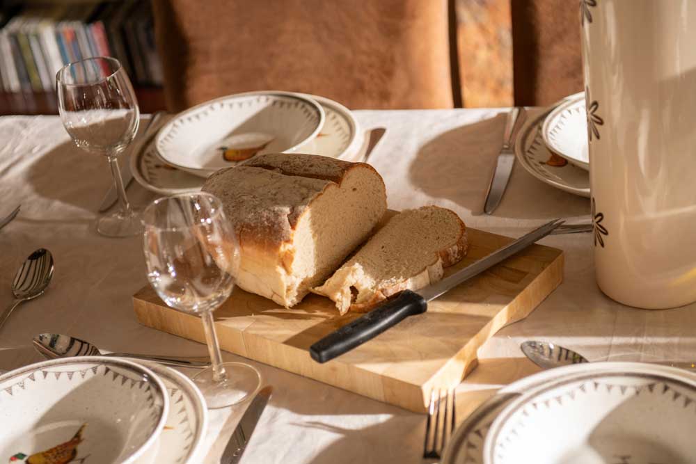 Freshly baked bread on the Farmhouse dining table