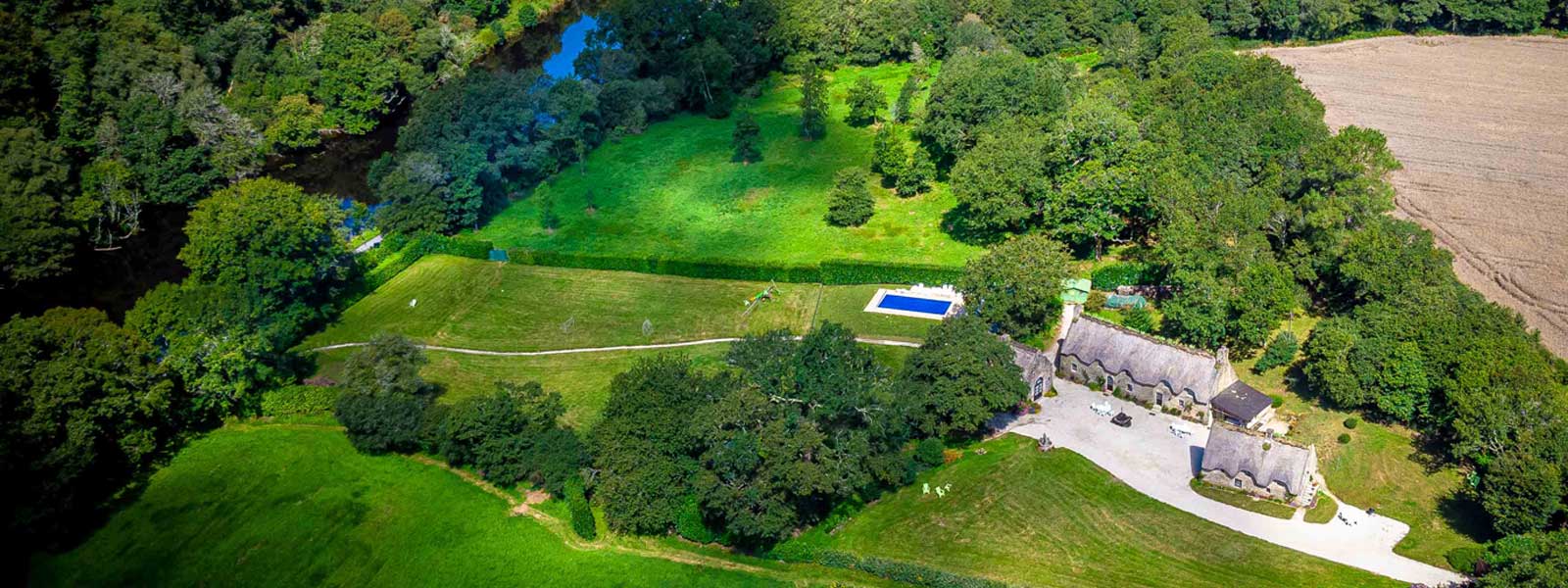 https://www.selectcottages.com/sites/default/files/revslider/image/drone-lagarenne-pool-blavet.jpg