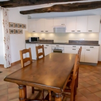 Fully equipped kitchen with oven, hob, 2 under counter fridges and an undercounted freezer.
