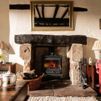 Sink into leather sofas in front of a roaring fire in the Farmhouse’s historic lounge